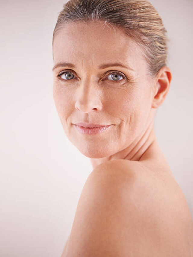 Cropped studio shot of a beautiful mature woman looking over her shoulder